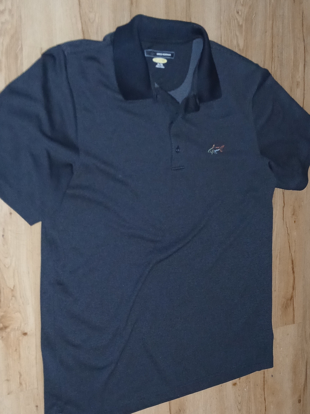 Greg Norman Play Dry Performance Polo in Black